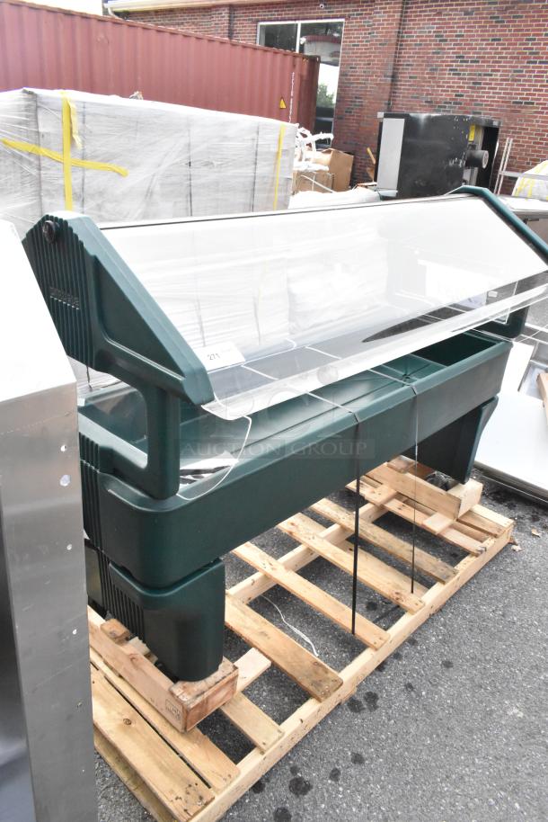 Brand new Carlisle 660808 "Six Star" 6' forest green youth salad bar, open base, visible scratch on side, on wooden pallet.