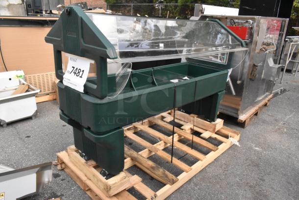 Brand new Carlisle 660808 "Six Star" portable youth food bar, forest green, open base, minor scratches, on a pallet.