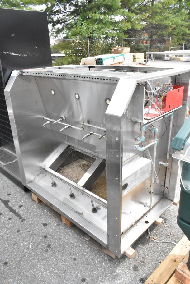 Wells 5' self-contained stainless steel grease hood. Features integrated ductwork and control panel. Used condition.