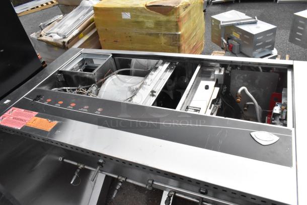 5' Wells stainless steel self-contained grease hood, showing control panel and internal components. Good condition.