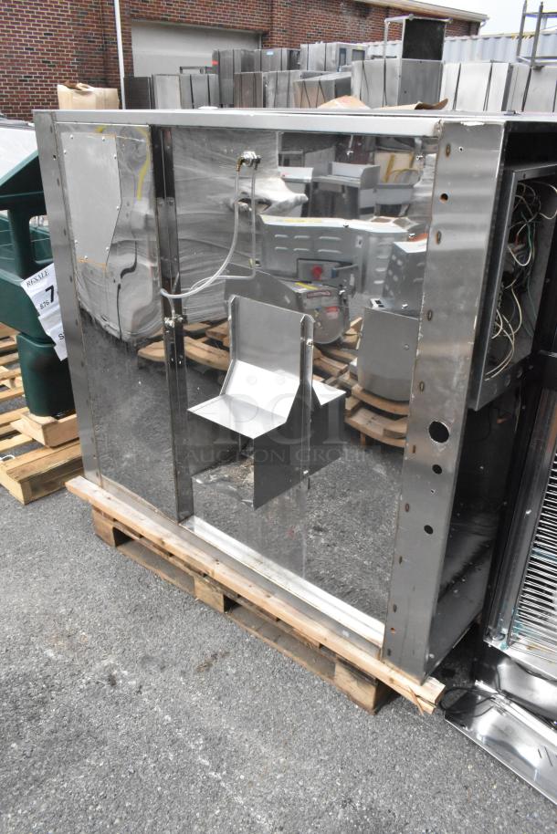 5' Wells stainless steel self-contained grease hood, reflective finish, good condition, shown on pallet.