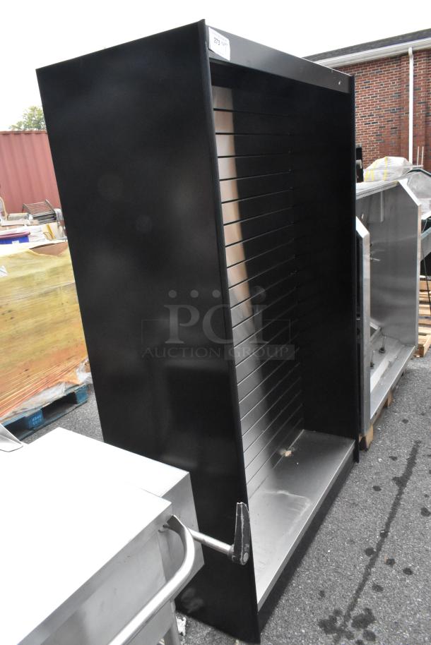 All State ASMMS491-DS Display Cabinet, black slatwall design, good condition, features adjustable shelving, metal construction.
