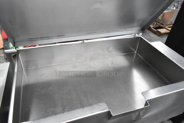 Stainless steel commercial floor style braising pan, open lid, spacious interior; ideal for industrial cooking.
