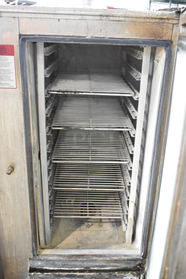 2018 Alto Shaam CTP10-10E stainless steel commercial combi convection oven, 208/240V, 3 Phase. Interior view with shelves.