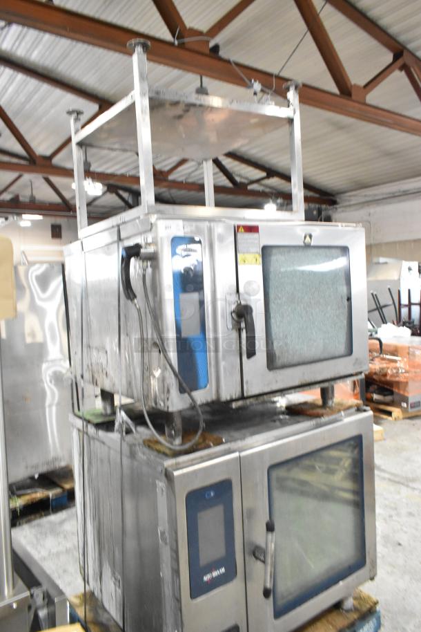 2 Alto Shaam CTP10-10E stainless steel commercial combi convection ovens on stand; includes broken glass detail.