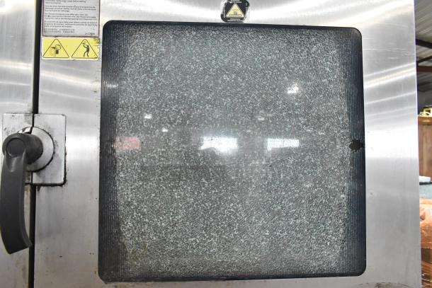 Alto Shaam stainless steel combi convection oven, Model CTP10-10E. Features broken glass door, electric, 208/240V, 3-phase.