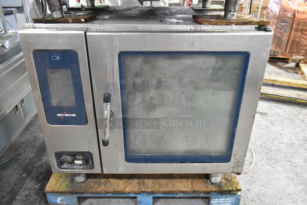 Alto Shaam CTP10-10E stainless steel combi convection oven, used condition, visible broken glass, on stand. Model 7.14 ESI.