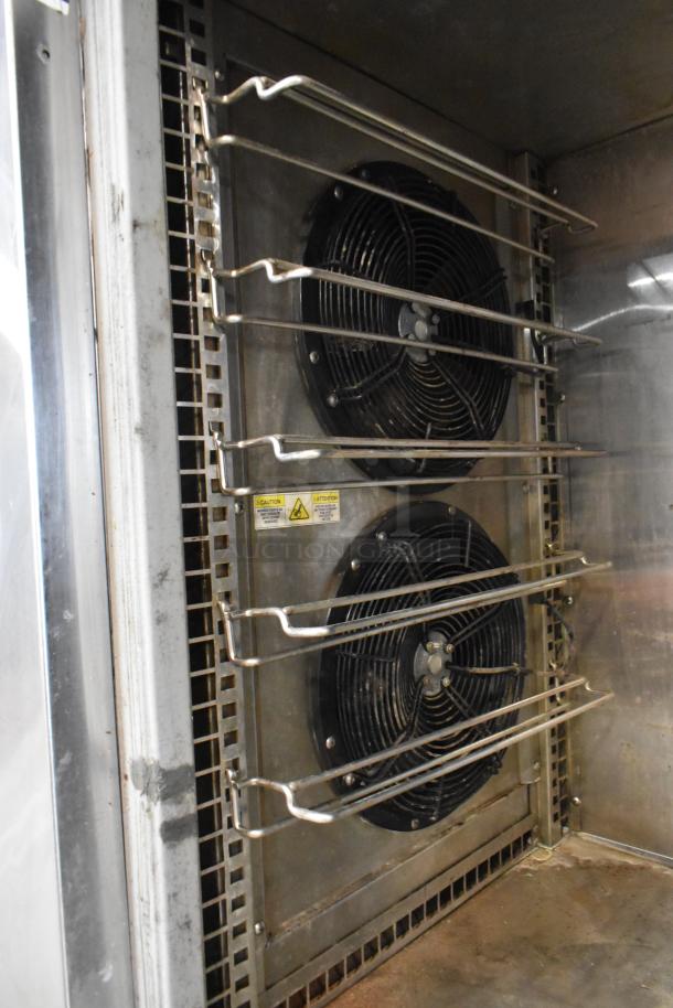 Randell BC-18 stainless steel commercial blast chiller with dual fans and safety labels. 115/230 volts, 1 phase.