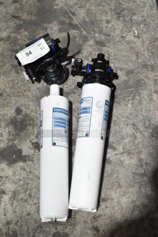 Brand new Bunn Filter Head and Easy Clear WEQ-25 Water Filter Cartridge. Includes 2 items, tags visible.