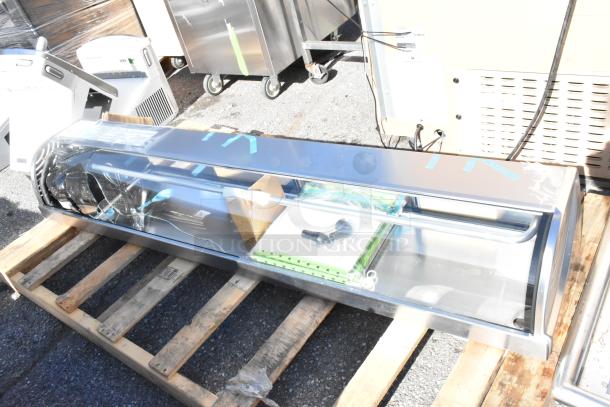 Brand new Hoshizaki HNC-180BA-L-SLH 71" sushi display case, curved glass, left-side compressor, minor glass damage.