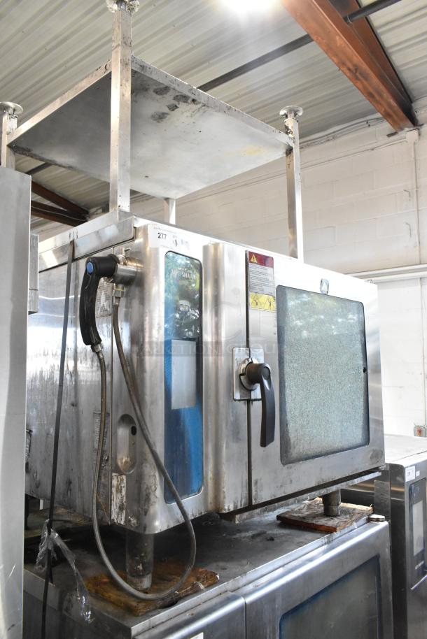 Alto Shaam 7.14 ESI stainless steel combi convection oven with equipment stand, broken glass door, 208/240V, 3 Phase.