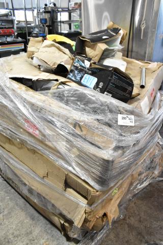 Eight brand new scratch and dent boxes with LED emergency light, wrapped in plastic, showing slight box damage.