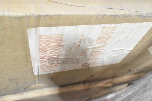 Cardboard box showing shipping label and barcode; item includes new scratch and dent LED emergency light.