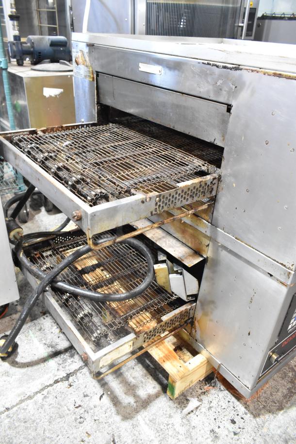 2023 Middleby Marshall CTX DZ33I stainless steel commercial conveyor pizza oven, electric, on casters, showing used condition.