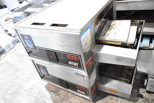 Two 2023 Middleby Marshall CTX DZ33I stainless steel conveyor pizza ovens on casters, electric, 208V, good condition.
