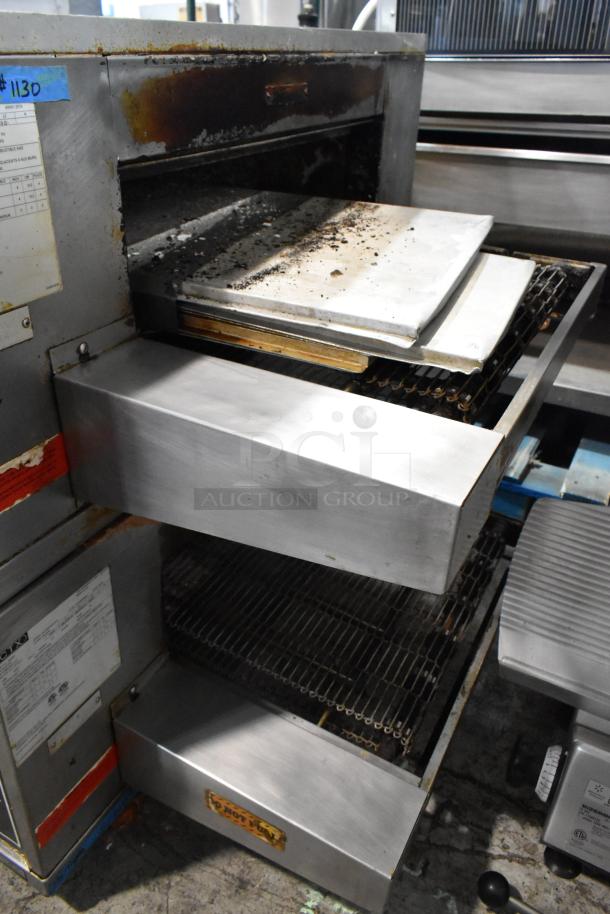 2 Middleby Marshall CTX DZ33I stainless steel conveyor pizza ovens on casters. Model DZ33I, 208V, 3/1 Phase. Used condition.