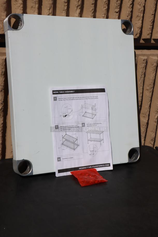 Regency stainless steel undershelf for 24"x24" tables, 18 gauge, with assembly instructions. Brand new, scratch-and-dent condition.