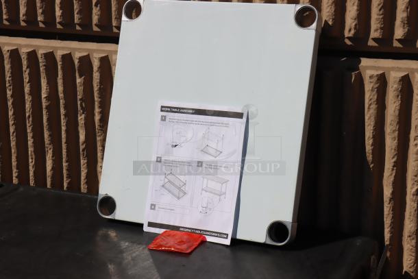 Brand new Regency Adjustable Stainless Steel Work Table Undershelf for 24" x 24" tables, model 600UT2424S. Includes assembly instructions.