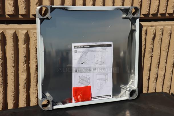 Regency adjustable stainless steel undershelf for 24"x24" work tables, model 600UT2424S. Brand new, 18 gauge. Assembly instructions visible.