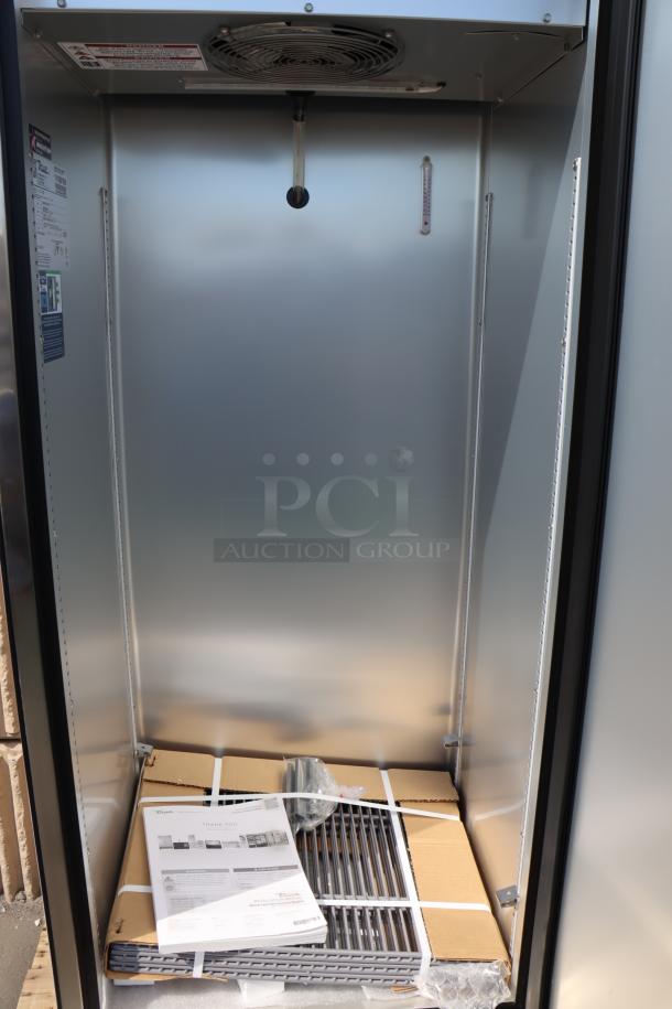 Brand new True T-12-HC refrigerator, 24 7/8", one section, solid door. Needs cord replacement. Interior shelves in packaging.