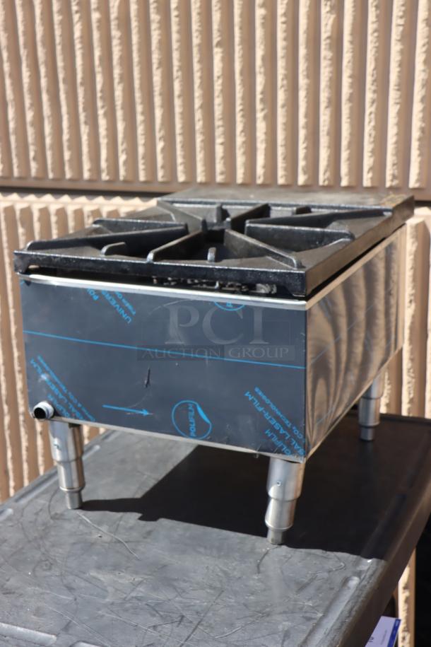 Town SR-24-G-SS stock pot range, natural gas, grate top, bent legs, protective wrap on sides, model SR-24-G-SS visible.