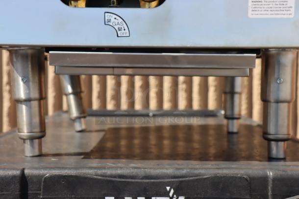 Town SR-24-G-SS Natural Gas Stock Pot Range; bent legs; on/off gas label visible; stainless steel finish.