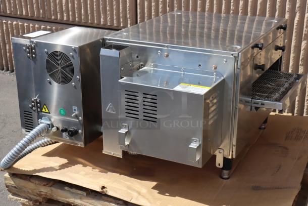 Cooking Performance Group 351ICOEVD conveyor oven, 32" belt, ventless, 6700W, 240V. Minor dents, conveyor slightly bent.