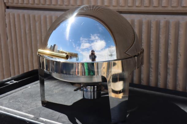 Brand new Acopa Supreme 6.5 Qt. round chafer model 922ec14, gold accents, roll top, minor scratches.