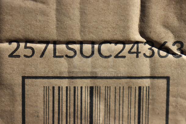 Lavex 257LSUC24363 utility cart's label on cardboard, showing model number. Cart missing wheel hardware, out of packaging.