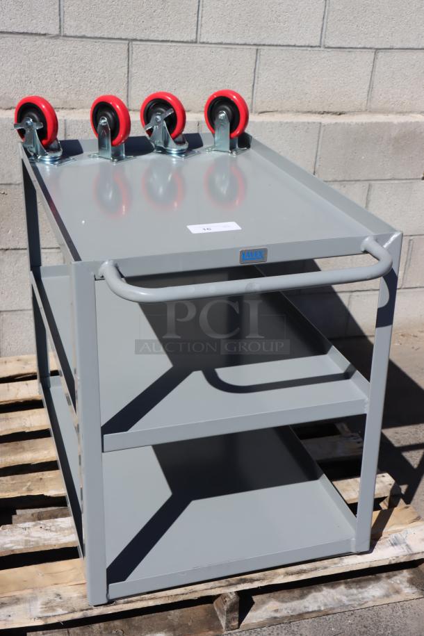 BRAND NEW Lavex 257LSUC24363 steel utility cart, 36"x24"x35", three trays, fully welded, minor scratches, red casters.