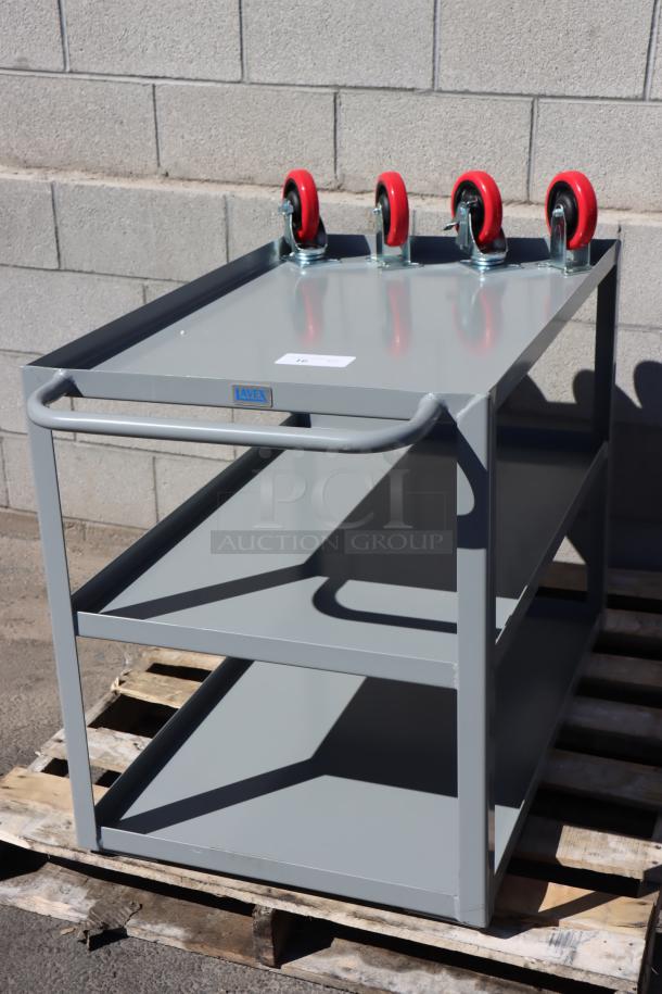 Brand new Lavex 257LSUC24363 36"x24"x35" three-tier steel utility cart, fully welded, on red casters, no packaging.