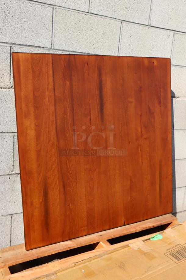 Brand new Lancaster Table & Seating 36"x36" solid wood live edge table top with rustic walnut finish, model 3493636ANTWA.