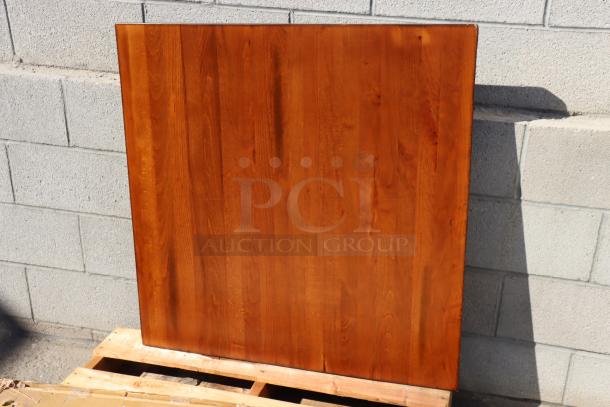 Brand new Lancaster 36"x36" solid wood live edge table top with rustic walnut finish, model 3493636ANTWA, minor scratch.