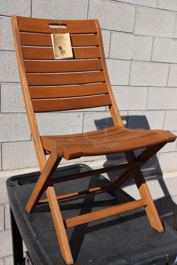 Outdoor Interiors #10050 eucalyptus folding armless chair, new, scratch-n-dent, tag attached, durable wood design.