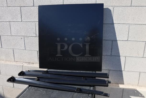 Brand new Lancaster Table & Seating 164BA3232BLK Alloy 31.5"x31.5" onyx black bar height table. Package damaged.