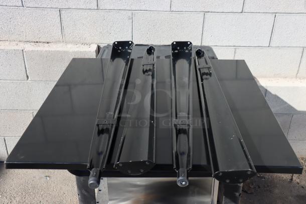 Brand new Lancaster 164BA3232BLK onyx black bar height table, 31.5"x31.5". Package damaged.