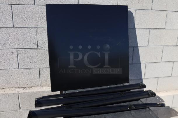 Brand new Lancaster Table & Seating 164BA3232BLK onyx black bar height outdoor table, 31.5" square. Package damaged.