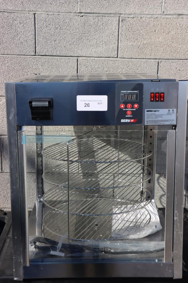 BRAND NEW SCRATCH-N-DENT ServIt PDW18D1 18" Pizza Warmer, 4-shelf rotating rack, missing glass pane, electronic controls visible.