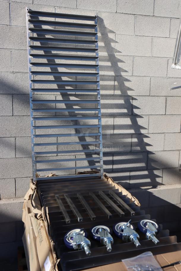 Regency 600PR20316K stainless steel bun pan rack, unassembled. Packaging rain-damaged. Includes 20 pan slots, caster wheels.