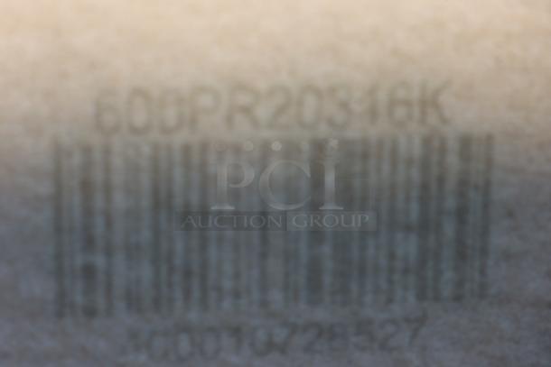 Barcode and model number 600PR20316K visible on the Regency bun/sheet pan rack packaging.