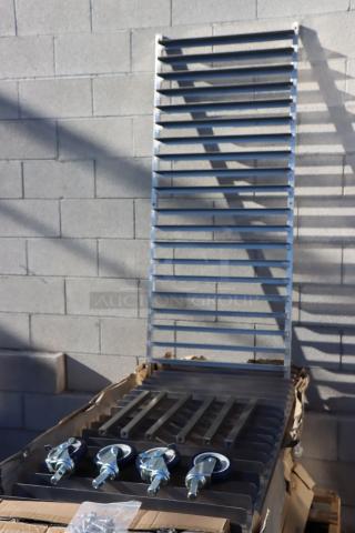 BRAND NEW Regency 20 Pan End Load Stainless Steel Bun Rack, Model 600PR20316K. Unassembled. Packaging damaged by rain.
