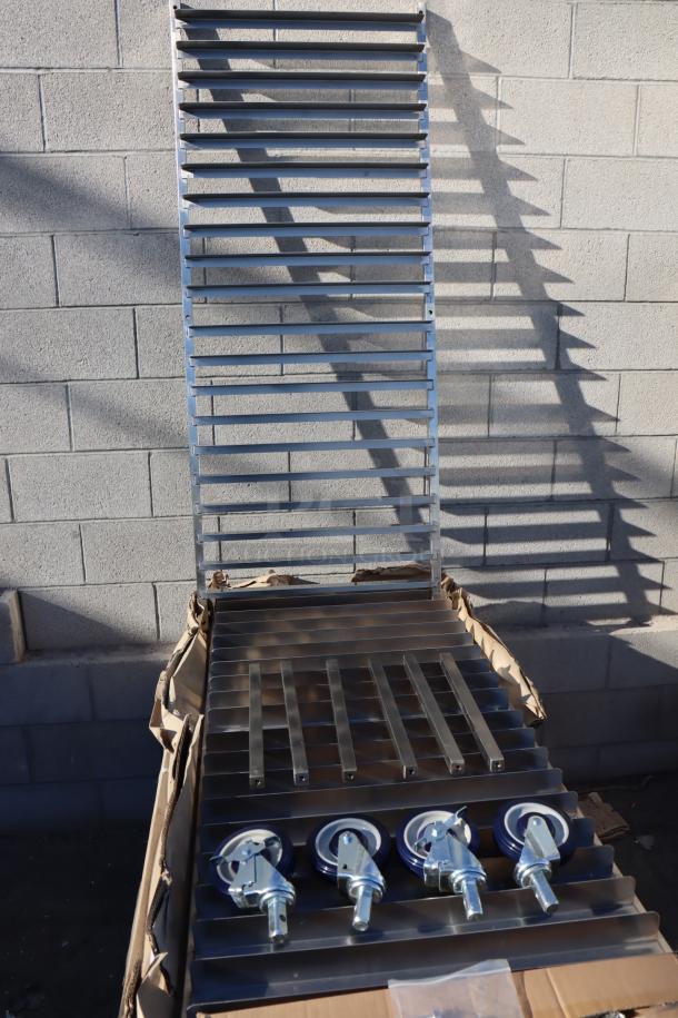 Brand new Regency 600PR20316K 20-pan end load stainless steel sheet pan rack, unassembled. Packaging water-damaged.