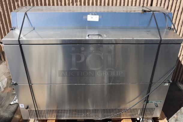 True TMC-58-S-DS-SS-HC milk cooler, stainless steel, 58 1/4", dented bottom, scratches near handles, 115V, 2.7A, 1 phase.