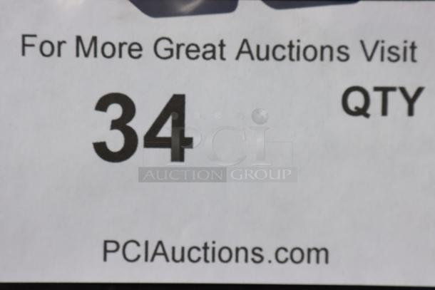 Alt text: Auction item tag with number 34 and website PCIAuctions.com.