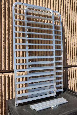 BRAND NEW Regency 600RIR16KD 16 Pan Aluminum Rack, unassembled. Scratch-N-Dent, original packaging damaged.