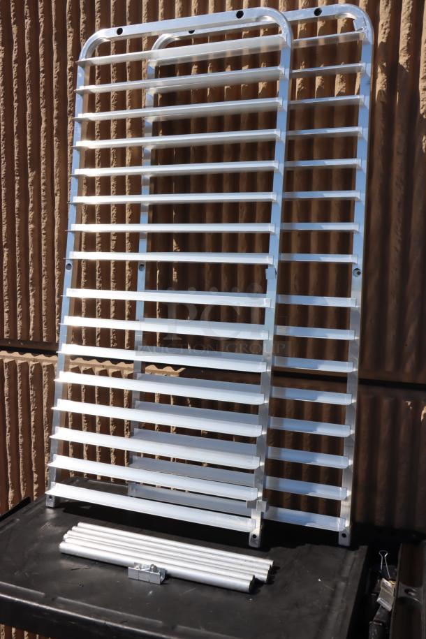 BRAND NEW Regency 600RIR16KD 16 Pan Aluminum Rack, unassembled, for reach-ins. Original packaging damaged, may be missing pieces.