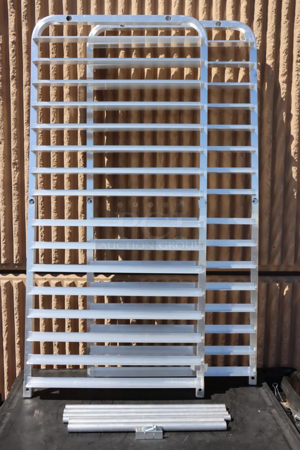 Brand new Regency 600RIR16KD 16 pan aluminum sheet rack, unassembled, original packaging damaged, parts may be missing.
