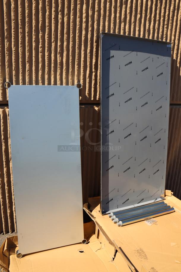 Steelton 30" x 60" stainless steel equipment stand, model 522SG3060, with minor denting and damaged box.