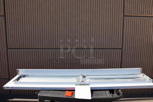 Regency stainless steel work table, model 600TB1884G, with backsplash and galvanized legs, shown brand new but scratch-n-dent.