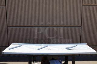 Brand new Regency 600WS1872HD 16-gauge stainless steel wall shelf, 18"x72". Slight scratches and dents visible.